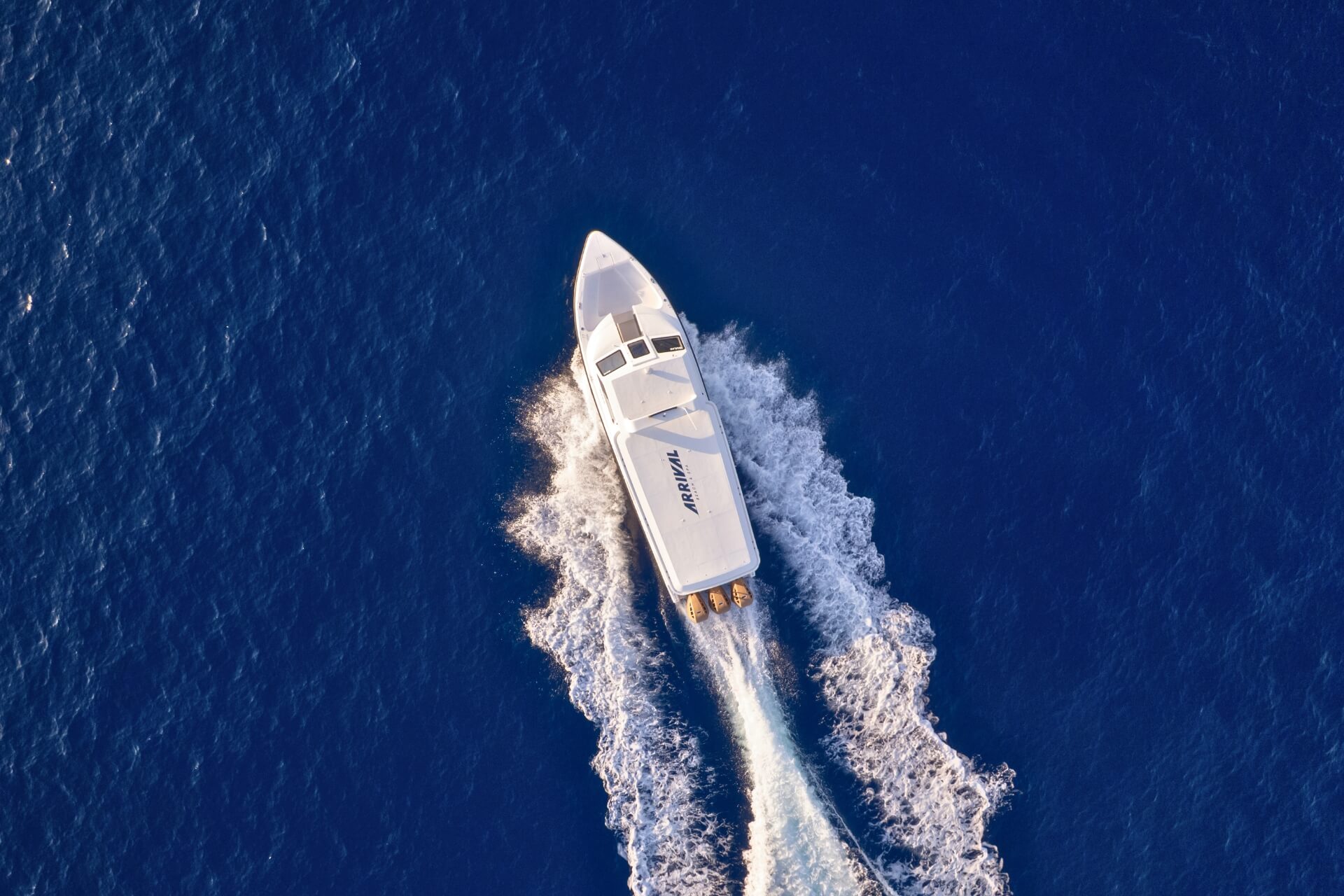 Arrival Beach & Spa Speed Boat Aerial Shot